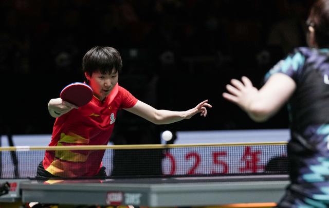 (251204) -- CHENGDU, Dec. 4, 2025 (Xinhua) -- Wang Manyu of China hits a return during the women's singles match against Lee Eunhye of South Korea during the stage 2 group match between China and South Korea at the ITTF Mixed Team World Cup 2025 in Chengdu, southwest China's Sichuan Province, Dec. 4, 2025. (Xinhua/Wang Ying)