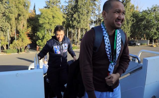 (251204) -- SANAA, Dec. 4, 2025 (Xinhua) -- This video screenshot shows sailors of cargo vessel Eternity C boarding a plane at the Sanaa International Airport, in Sanaa, Yemen, on Dec. 3, 2025.
  Yemen's Houthi group on Wednesday released 10 sailors, including nine Filipinos, nearly five months after they were detained following the sinking of the cargo vessel Eternity C in the Red Sea off western Yemen.
   Al-Masirah TV, the Houthi-run channel, reported that the "crew of the Eternity C was released through Omani mediation and the sailors were transferred from Sanaa to the Omani capital Muscat." (Houthi Media Center/Handout via Xinhua)