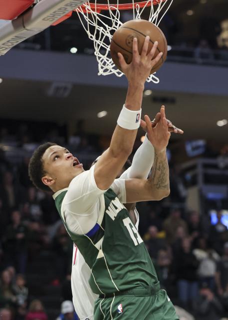 (251204) -- MILWAUKEE, Dec. 4, 2025 (Xinhua) -- Ryan Rollins of Milwaukee Bucks drives to the basket during the 2025-2026 NBA regular season game between Milwaukee Bucks and Detroit Pistons in Milwaukee, the United States, on Dec. 3, 2025. (Photo by Joel Lerner/Xinhua)