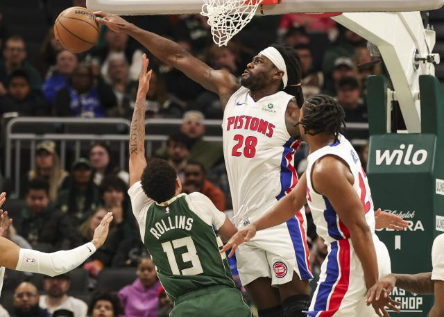 (251204) -- MILWAUKEE, Dec. 4, 2025 (Xinhua) -- Isaiah Stewart (top) of Detroit Pistons blocks a shot by Ryan Rollins (L) of Milwaukee Bucks during the 2025-2026 NBA regular season game between Milwaukee Bucks and Detroit Pistons in Milwaukee, the United States, on Dec. 3, 2025. (Photo by Joel Lerner/Xinhua)