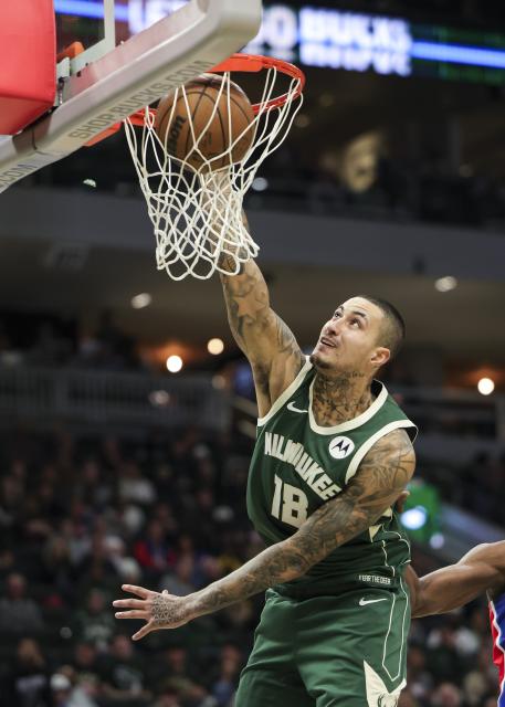 (251204) -- MILWAUKEE, Dec. 4, 2025 (Xinhua) -- Kyle Kuzma of Milwaukee Bucks dunks during the 2025-2026 NBA regular season game between Milwaukee Bucks and Detroit Pistons in Milwaukee, the United States, on Dec. 3, 2025. (Photo by Joel Lerner/Xinhua)