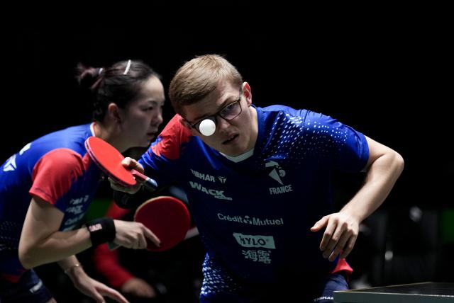 (251204) -- CHENGDU, Dec. 4, 2025 (Xinhua) -- Alexis Lebrun (R)/Yuan Jia Nan of France compete in the mixed doubles match against Wang Chuqin/Sun Yingsha of China during the stage 2 group match between China and France at the ITTF  Mixed Team World Cup 2025 in Chengdu, southwest China's Sichuan Province, Dec. 4, 2025. (Xinhua/Wang Ying)