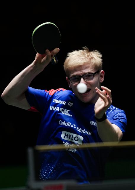 (251204) -- CHENGDU, Dec. 4, 2025 (Xinhua) -- Felix Lebrun of France competes in the men's singles match against Liang Jingkun of China during the stage 2 group match between China and France at the ITTF  Mixed Team World Cup 2025 in Chengdu, southwest China's Sichuan Province, Dec. 4, 2025. (Xinhua/Wang Ying)