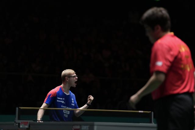 (251204) -- CHENGDU, Dec. 4, 2025 (Xinhua) -- Felix Lebrun of France celebrates in the men's singles match against Liang Jingkun of China during the stage 2 group match between China and France at the ITTF  Mixed Team World Cup 2025 in Chengdu, southwest China's Sichuan Province, Dec. 4, 2025. (Xinhua/Wang Ying)