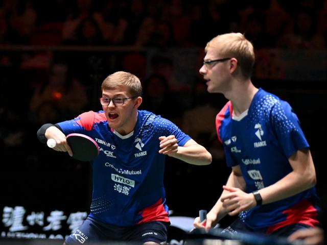 (251204) -- CHENGDU, Dec. 4, 2025 (Xinhua) -- Alexis Lebrun (L)/Felix Lebrun of France compete in the mixed doubles match against Wang Chuqin/Lin Shidong of China during the stage 2 group match between China and France at the ITTF  Mixed Team World Cup 2025 in Chengdu, southwest China's Sichuan Province, Dec. 4, 2025. (Xinhua/Xu Bingjie)
