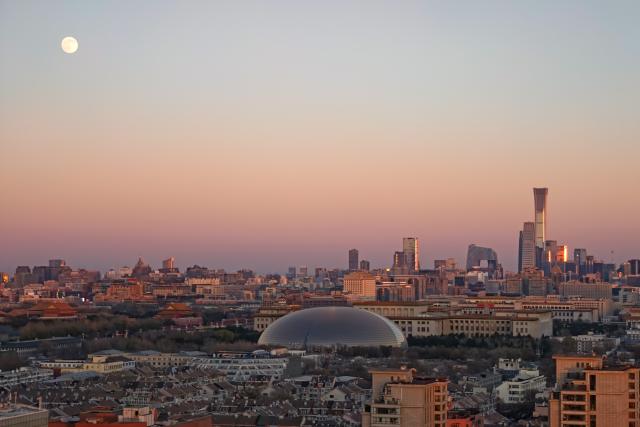 (251204) -- BEIJING, Dec. 4, 2025 (Xinhua) -- This photo taken with a mobile phone shows a full moon in Beijing, capital of China, Dec. 4, 2025. This year's second-largest full moon to the eyes of lunar observers will appear on Friday morning, but the best viewing time falls on Thursday evening. (Xinhua/Zhang Cheng)