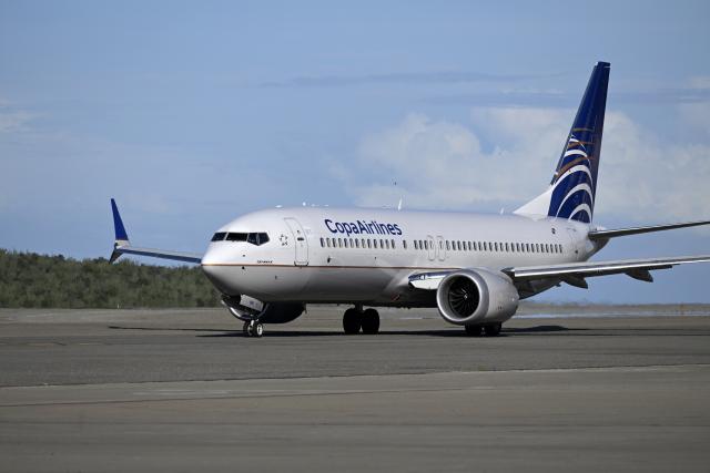 (251204) -- CARACAS, Dec. 4, 2025 (Xinhua) -- A Copa Airlines airplane taxis at Simon Bolivar International Airport in Maiquetia, Venezuela, Dec. 3, 2025. Panamanian carrier Copa Airlines has suspended Thursday and Friday flights to and from Venezuela's capital Caracas, citing a navigation signal issue reported by its pilots. (Xinhua/Li Muzi)