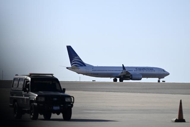 (251204) -- CARACAS, Dec. 4, 2025 (Xinhua) -- A Copa Airlines airplane taxis at Simon Bolivar International Airport in Maiquetia, Venezuela, Dec. 3, 2025. Panamanian carrier Copa Airlines has suspended Thursday and Friday flights to and from Venezuela's capital Caracas, citing a navigation signal issue reported by its pilots. (Xinhua/Li Muzi)
