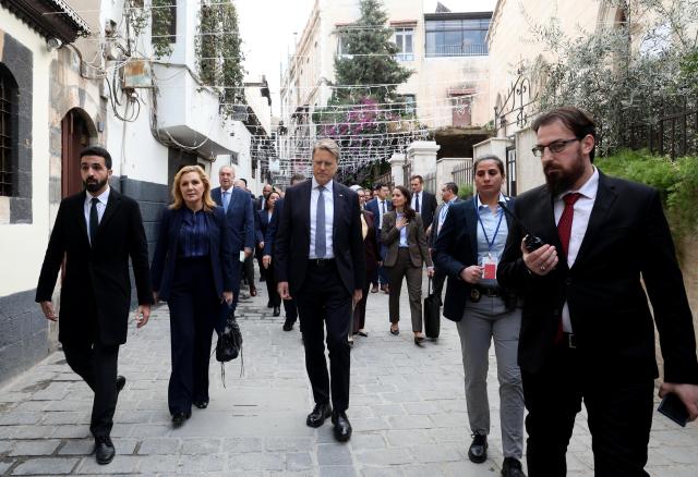 (251204) -- DAMASCUS, Dec. 4, 2025 (Xinhua) -- Members of the UN Security Council delegation visit the old city of Damascus, Syria, Dec. 4, 2025. A United Nations Security Council (UNSC) delegation made a rare visit to Syria on Thursday, marking a high-level engagement with Syrian authorities since they took power following the ouster of former President Bashar al-Assad in December 2024. (Photo by Ammar Safarjalani/Xinhua)