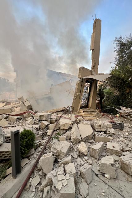 (251204) -- JBAA, Dec. 4, 2025 (Xinhua) -- Photo taken on Dec. 4, 2025 shows buildings destroyed by Israeli airstrikes in the town of Jbaa, south Lebanon. Israeli airstrikes targeted buildings in four towns in southern Lebanon on Thursday afternoon, Lebanon's official National News Agency reported. According to a Lebanese army intelligence source, four buildings were destroyed and around 20 nearby homes were damaged. (Photo by Ali Hashisho/Xinhua)