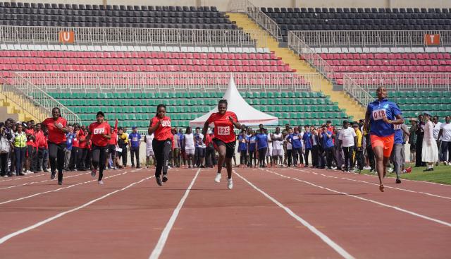 (251205) -- NAIROBI, Dec. 5, 2025 (Xinhua) -- Participants compete in the women's 100m race at the China-Kenya Friendship Games in Nairobi, Kenya, on Dec. 4, 2025. The inaugural China-Kenya Friendship Games took place on Thursday in Nairobi, the capital of Kenya, as part of efforts to strengthen bilateral ties.
The day-long competition saw over 700 Chinese and Kenyan attendants from 19 Chinese companies who are members of the Kenya-China Economic and Trade Association (KCETA), featuring track and field events, as well as fun games. (Xinhua/Han Xu)