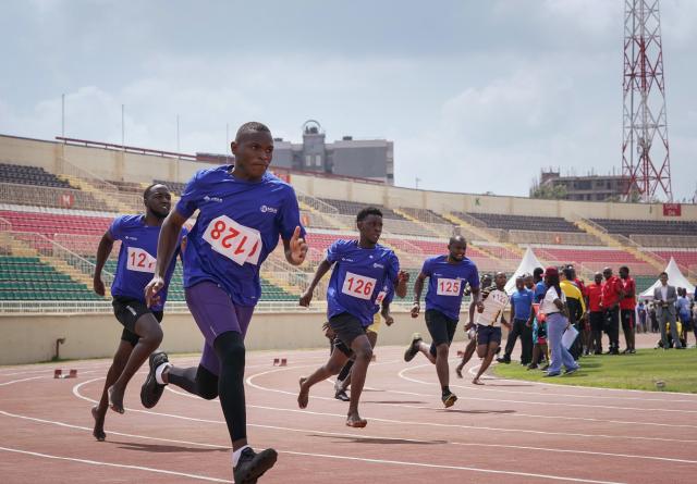 (251205) -- NAIROBI, Dec. 5, 2025 (Xinhua) -- Participants compete in the men's 200m race at the China-Kenya Friendship Games in Nairobi, Kenya, on Dec. 4, 2025. The inaugural China-Kenya Friendship Games took place on Thursday in Nairobi, the capital of Kenya, as part of efforts to strengthen bilateral ties.
The day-long competition saw over 700 Chinese and Kenyan attendants from 19 Chinese companies who are members of the Kenya-China Economic and Trade Association (KCETA), featuring track and field events, as well as fun games. (Xinhua/Han Xu)
