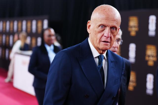 (251205) -- WASHINGTON, D.C., Dec. 5, 2025 (Xinhua) -- FIFA Referees Committee chairman Pierluigi Collina arrives for the welcome reception ahead of the final draw for the 2026 FIFA World Cup at John F. Kennedy Center for the Performing Arts in Washington, D.C., the United States, on Dec. 4, 2025. (Xinhua/Jia Haocheng)