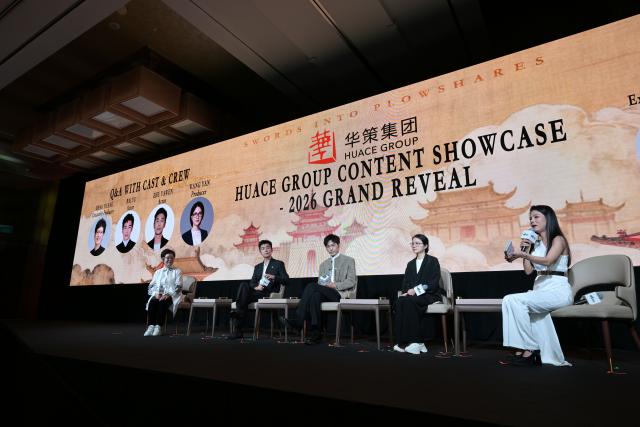 (251205) -- SINGAPORE, Dec. 5, 2025 (Xinhua) -- This photo taken on Dec. 4, 2025 shows a scene of a promotion event of Swords into Plowshares, a historical drama produced by Huace Group, during the 26th Asia TV Forum and Market in Singapore. TO GO WITH "Feature: Episodes that travel: how Chinese dramas speak universally" (Photo by Then Chih Wey/Xinhua)