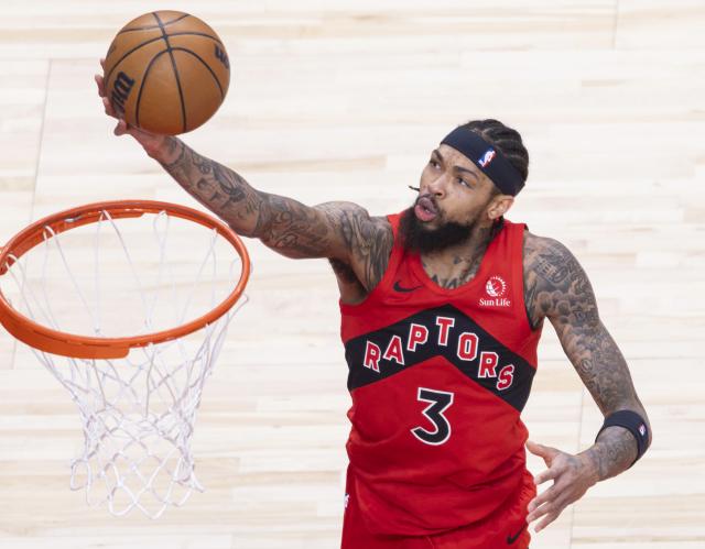 (251205) -- TORONTO, Dec. 5, 2025 (Xinhua) -- Brandon Ingram of Toronto Raptors goes up for a layup during the 2025-2026 NBA regular season game between Toronto Raptors and Los Angeles Lakers in Toronto, Canada, on Dec. 4, 2025. (Photo by Zou Zheng/Xinhua)