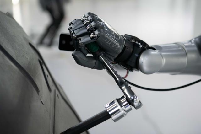 (251205) -- HEFEI, Dec. 5, 2025 (Xinhua) -- A humanoid robot conducts screw fastening training at a data collection pre-training center for humanoid robots in Hefei, east China's Anhui Province, Dec. 4, 2025. Using technologies such as physical simulation, virtual reality, and big data modelling, the data collection pre-training center helps robots adapt to diverse tasks from handling precision components to daily household services, while shortening research and development cycles and reducing relevant costs.
  The center has attracted companies to test their robots here through structured courses and assessments. (Xinhua/Zhang Duan)