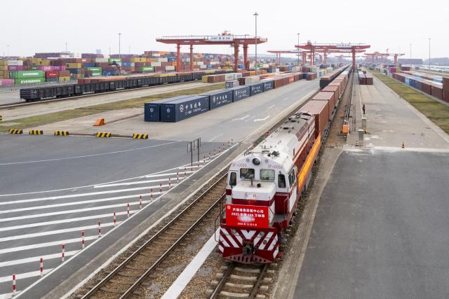 (251205) -- SHANGHAI, Dec. 5, 2025 (Xinhua) -- A drone photo taken on Dec. 5, 2025 shows a view of the Luchao Port container center station in east China's Shanghai. As of Dec. 5, Shanghai's sea-rail combined transport business volume has exceeded one million TEUs in 2025, registering a year-on-year increase of nearly 20 percent. (Xinhua/Wang Xiang)