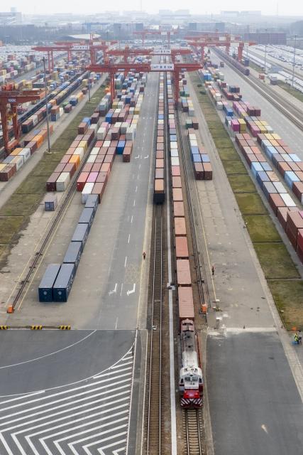 (251205) -- SHANGHAI, Dec. 5, 2025 (Xinhua) -- An aerial drone photo taken on Dec. 5, 2025 shows a view of the Luchao Port container center station in east China's Shanghai. As of Dec. 5, Shanghai's sea-rail combined transport business volume has exceeded one million TEUs in 2025, registering a year-on-year increase of nearly 20 percent. (Xinhua/Wang Xiang)