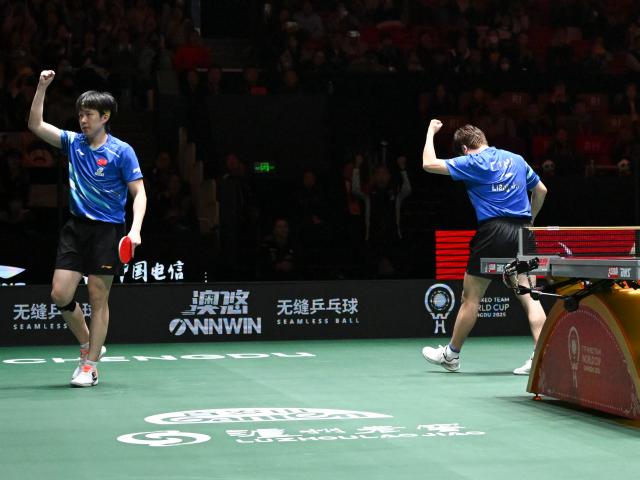 (251205) -- CHENGDU, Dec. 5, 2025 (Xinhua) -- Wang Chuqin (R)/Liang Jingkun of China compete in the men's doubles match against Benedikt Duda/Qiu Dang of Germany during the stage 2 group match between China and Germany at the ITTF Mixed Team World Cup 2025 in Chengdu, southwest China's Sichuan Province, Dec. 5, 2025. (Xinhua/Xu Bingjie)