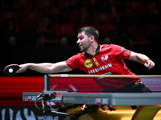 (251205) -- CHENGDU, Dec. 5, 2025 (Xinhua) -- Patrick Franziska of Germany competes in the men's singles match against Wang Chuqin of China during the stage 2 group match between China and Germany at the ITTF Mixed Team World Cup 2025 in Chengdu, southwest China's Sichuan Province, Dec. 5, 2025. (Xinhua/Xu Bingjie)