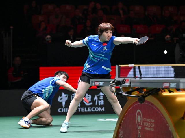 (251205) -- CHENGDU, Dec. 5, 2025 (Xinhua) -- Kuai Man (R)/Lin Shidong of China compete in the mixed doubles match against Sabine Winter/Benedikt Duda of Germany during the stage 2 group match between China and Germany at the ITTF Mixed Team World Cup 2025 in Chengdu, southwest China's Sichuan Province, Dec. 5, 2025. (Xinhua/Xu Bingjie)