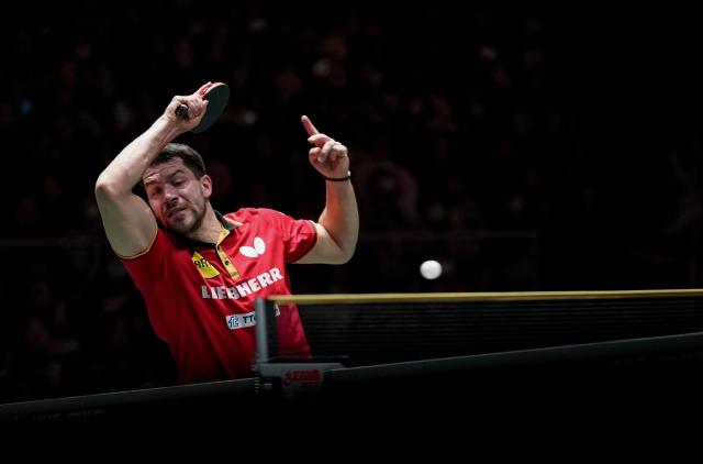 (251205) -- CHENGDU, Dec. 5, 2025 (Xinhua) -- Patrick Franziska of Germany compete in the men's singles match against Wang Chuqin of China during the stage 2 group match between China and Germany at the ITTF Mixed Team World Cup 2025 in Chengdu, southwest China's Sichuan Province, Dec. 5, 2025. (Xinhua/Wang Ying)