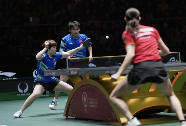 (251205) -- CHENGDU, Dec. 5, 2025 (Xinhua) -- Kuai Man (1st L)/Lin Shidong of China compete in the mixed doubles match against Sabine Winter/Benedikt Duda of Germany during the stage 2 group match between China and Germany at the ITTF Mixed Team World Cup 2025 in Chengdu, southwest China's Sichuan Province, Dec. 5, 2025. (Xinhua/Wang Ying)