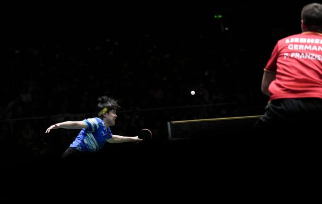 (251205) -- CHENGDU, Dec. 5, 2025 (Xinhua) -- Wang Chuqin of China competes in the men's singles match against Patrick Franziska of Germany during the stage 2 group match between China and Germany at the ITTF Mixed Team World Cup 2025 in Chengdu, southwest China's Sichuan Province, Dec. 5, 2025. (Xinhua/Wang Ying)