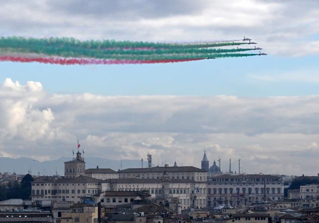 (251205) -- ROME, Dec. 5, 2025 (Xinhua) -- Italian aerobatic squad Frecce Tricolori flies over Rome during the cauldron lighting ceremony of the 2026 Milan-Cortina Olympic Winter Games at the Quirinale Palace in Rome, Italy, Dec. 5, 2025. (Photo by Alberto Lingria/Xinhua)