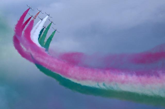 (251205) -- ROME, Dec. 5, 2025 (Xinhua) -- Italian aerobatic squad Frecce Tricolori flies over Rome during the cauldron lighting ceremony of the 2026 Milan-Cortina Olympic Winter Games at the Quirinale Palace in Rome, Italy, Dec. 5, 2025. (Photo by Alberto Lingria/Xinhua)