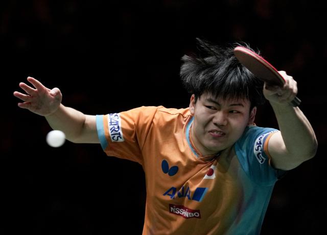 (251205) -- BEIJING, Dec. 5, 2025 (Xinhua) -- Matsushima Sora of Japan competes in the men's singles match against An Jaehyun of South Korea during the stage 2 group match between South Korea and Japan at the ITTF Mixed Team World Cup 2025 in Chengdu, southwest China's Sichuan Province, Dec. 5, 2025. (Xinhua/Wang Ying)