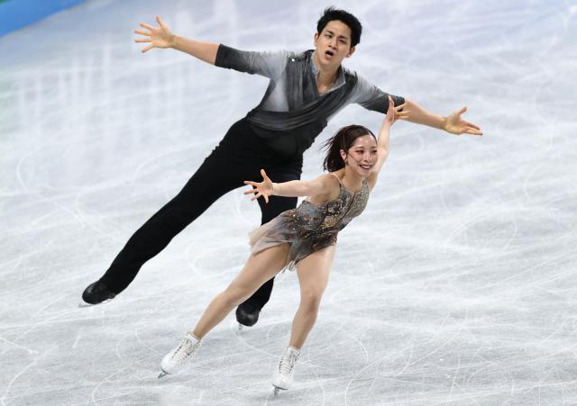 (251205) -- NAGOYA, Dec. 5, 2025 (Xinhua) -- Miura Riku (front)/Kihara Ryuichi of Japan compete during the pair skating free skating at ISU Grand Prix of Figure Skating Final 2025 in Nagoya, Japan, Dec. 5, 2025. (Xinhua/Yue Chenxing)