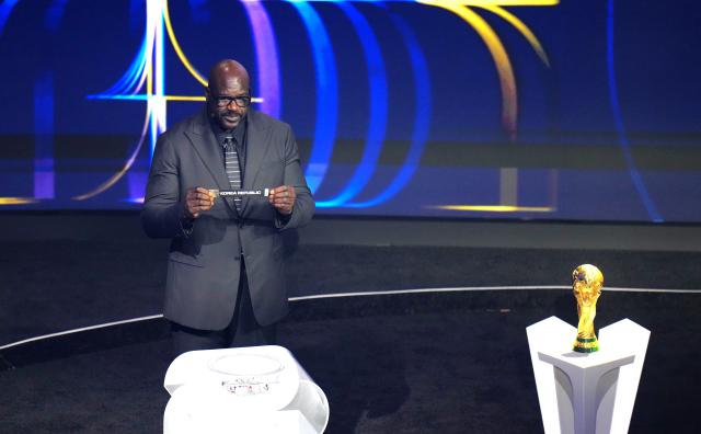 (251206) -- WASHINGTON D.C., Dec. 6, 2025 (Xinhua) -- Draw Assistant Shaquille O'Neal holds the ticket of South Korea during the FIFA World Cup 2026 Final Draw at the Kennedy Center in Washington D.C., the United States. (Xinhua/Wu Xiaoling)