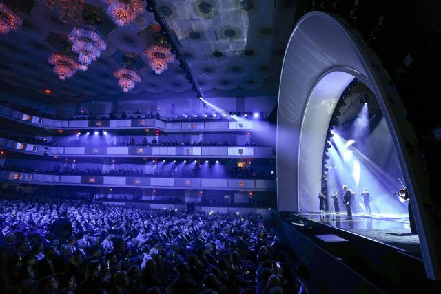 (251206) -- WASHINGTON D.C., Dec. 6, 2025 (Xinhua) -- Performers act ahead of the FIFA World Cup 2026 Final Draw at the Kennedy Center in Washington D.C., the United States, Dec. 5, 2025. (Xinhua/Jia Haocheng)