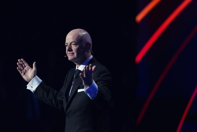 (251206) -- WASHINGTON D.C., Dec. 6, 2025 (Xinhua) -- FIFA President Giovanni Infantino addresses the audience during the FIFA World Cup 2026 Final Draw at the Kennedy Center in Washington D.C., the United States, Dec. 5, 2025. (Xinhua/Jia Haocheng)