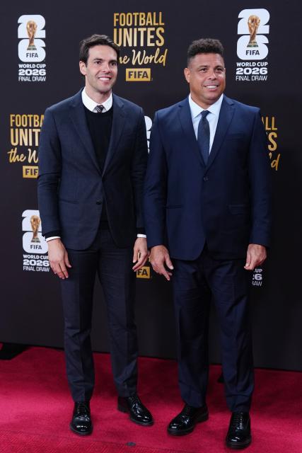 (251206) --  WASHINGTON D.C., Dec. 6, 2025 (Xinhua) -- Former Brazilian footballers Kaka (L) and Ronaldo Nazario arrive on the red carpet ahead of the FIFA World Cup 2026 Final Draw at the Kennedy Center in Washington D.C., the United States, Dec. 5, 2025. (Xinhua/Jia Haocheng)