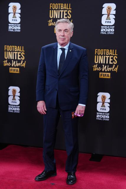 (251206) --  WASHINGTON D.C., Dec. 6, 2025 (Xinhua) -- Carlo Ancelotti, head coach of the Brazilian national soccer team arrives on the red carpet ahead of the FIFA World Cup 2026 Final Draw at the Kennedy Center in Washington D.C., the United States, Dec. 5, 2025. (Xinhua/Jia Haocheng)