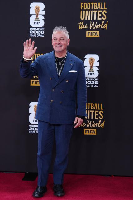 (251206) --  WASHINGTON D.C., Dec. 6, 2025 (Xinhua) -- Former Italian footballer Roberto Baggio arrives on the red carpet ahead of the FIFA World Cup 2026 Final Draw at the Kennedy Center in Washington D.C., the United States, Dec. 5, 2025. (Xinhua/Jia Haocheng)
