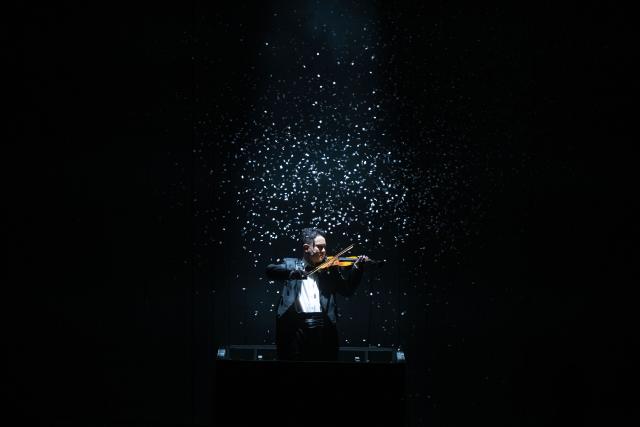 (251206) -- BEIJING, Dec. 6, 2025 (Xinhua) -- An artist performs in a musical drama commemorating the 120th anniversary of the birth of the late Chinese composer Xian Xinghai in Macao, south China, Dec. 5, 2025. (Xinhua/Cheong Kam Ka)