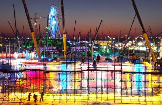 (251206) -- BEIJING, Dec. 6, 2025 (Xinhua) -- A drone photo taken on Dec. 4, 2025 shows the construction site of Ice and Snow World in Harbin, northeast China's Heilongjiang Province. The 27th edition of Ice and Snow World in Harbin has recently kicked off its construction work, which involves more than 10,000 workers and about 1,000 machines. The park area is expected to be extended to 1.2 million square meters, the largest of all editions in history. (Photo by Liu Yang/Xinhua)