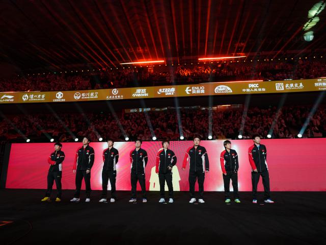 (251206) -- CHENGDU, Dec. 6, 2025 (Xinhua) -- Players of China line up before the stage 2 group match between China and Japan at the ITTF Mixed Team World Cup 2025 in Chengdu, southwest China's Sichuan Province, Dec. 6, 2025. (Xinhua/Wang Xi)