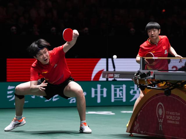 (251206) -- CHENGDU, Dec. 6, 2025 (Xinhua) -- Sun Yingsha/Wang Chuqin(L) of China compete during the mixed doubles match against Harimoto Miwa/Togami Shunsuke of Japan during the stage 2 group match between China and Japan at the ITTF Mixed Team World Cup 2025 in Chengdu, southwest China's Sichuan Province, Dec. 6, 2025. (Xinhua/Wang Xi)