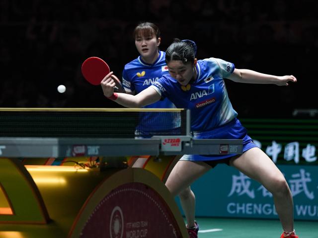 (251206) -- CHENGDU, Dec. 6, 2025 (Xinhua) -- Harimoto Miwa(R)/Satsuki Odo of Japan compete during the women's doubles match against Wang Manyu/Kuai Man of China during the stage 2 group match between China and Japan at the ITTF Mixed Team World Cup 2025 in Chengdu, southwest China's Sichuan Province, Dec. 6, 2025. (Xinhua/Wang Xi)