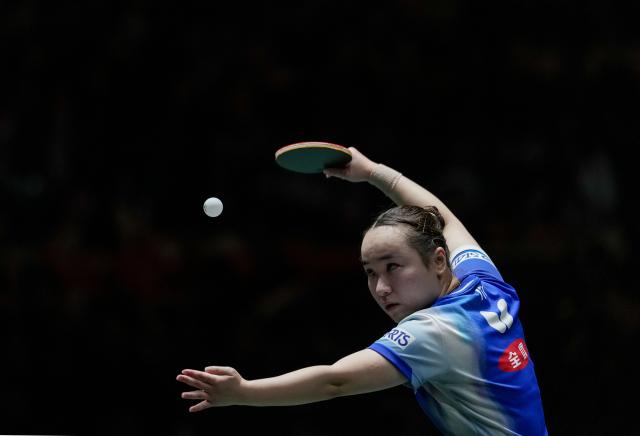 (251206) -- CHENGDU, Dec. 6, 2025 (Xinhua) -- Ito Mima of Japan serves during the women's singles match against Wang Manyu of China during the stage 2 group match between China and Japan at the ITTF Mixed Team World Cup 2025 in Chengdu, southwest China's Sichuan Province, Dec. 6, 2025. (Xinhua/Wang Ying)