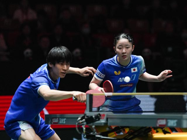 (251206) -- CHENGDU, Dec. 6, 2025 (Xinhua) -- Harimoto Miwa(R)/Togami Shunsuke of Japan compete during the women's doubles match against Sun Yingsha/Wang Chuqin of China during the stage 2 group match between China and Japan at the ITTF Mixed Team World Cup 2025 in Chengdu, southwest China's Sichuan Province, Dec. 6, 2025. (Xinhua/Wang Xi)
