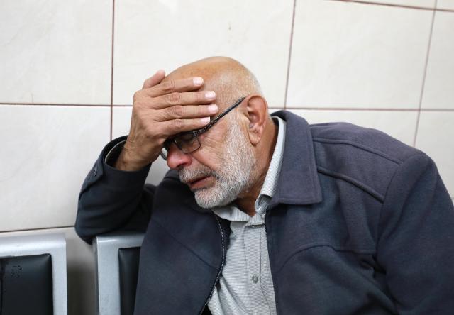 (251206) -- NABLUS, Dec. 6, 2025 (Xinhua) -- A man mourns over the Palestinian man Baha Abdel Rahman Rashed killed by the Israeli forces, at a hospital in the West Bank city of Nablus, on Dec. 5, 2025. The 38-year-old Baha Abdel Rahman Rashed, was shot dead by Israeli soldiers on Friday in the village of Odala, south of the city of Nablus in the northern West Bank, the Palestinian Ministry of Health said. (Photo by Ayman Nobani/Xinhua)