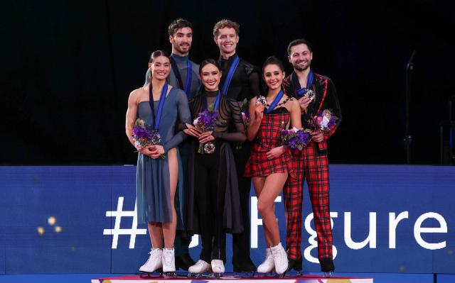 (251206) -- NAGOYA, Dec. 6, 2025 (Xinhua) -- Gold medalists Madison Chock (front C)/Evan Bates (back C) of the United States, silver medalists Laurence Fournier Beaudry (front L)/Guillaume Cizeron (back L) of France and bronze medalists Lilah Fear (front R)/Lewis Gibson of Britain pose during the awarding ceremony for the ice dance at ISU Grand Prix of Figure Skating Final 2025 in Nagoya, Japan, Dec. 6, 2025. (Xinhua/Yue Chenxing)