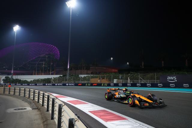 (251207) -- ABU DHABI, Dec. 7, 2025 (Xinhua) -- McLaren's British Driver Lando Norris competes during the Qualifying of Formula One Abu Dhabi Grand Prix at the Yas Marina Circuit in Abu Dhabi, the United Arab Emirates, on Dec. 6, 2025. (Photo by Qian Jun/Xinhua)
