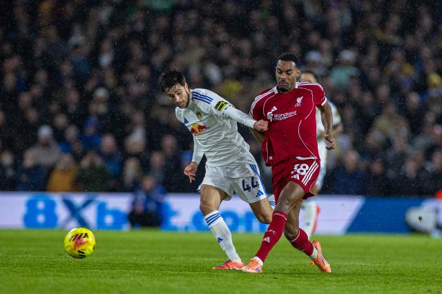 (251207) --  LEEDS, Dec. 7, 2025 (Xinhua) -- Liverpool's Ryan Gravenberch (R) is challenged by Leeds United's Ilia Gruev during the English Premier League match between Leeds United and Liverpool in Leeds, Britain, on Dec. 6, 2025. (Xinhua)
FOR EDITORIAL USE ONLY. NOT FOR SALE FOR MARKETING OR ADVERTISING CAMPAIGNS. NO USE WITH UNAUTHORIZED AUDIO, VIDEO, DATA, FIXTURE LISTS, CLUB/LEAGUE LOGOS OR "LIVE" SERVICES. ONLINE IN-MATCH USE LIMITED TO 45 IMAGES, NO VIDEO EMULATION. NO USE IN BETTING, GAMES OR SINGLE CLUB/LEAGUE/PLAYER PUBLICATIONS.