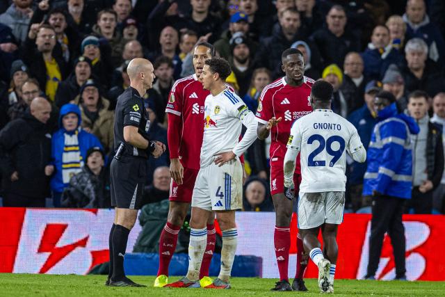 (251207) --  LEEDS, Dec. 7, 2025 (Xinhua) -- Liverpool's captain Virgil van Dijk (2nd L) and Ibrahima Konate react as Leeds United are awarded a penalty during the English Premier League match between Leeds United and Liverpool in Leeds, Britain, on Dec. 6, 2025. (Xinhua)
FOR EDITORIAL USE ONLY. NOT FOR SALE FOR MARKETING OR ADVERTISING CAMPAIGNS. NO USE WITH UNAUTHORIZED AUDIO, VIDEO, DATA, FIXTURE LISTS, CLUB/LEAGUE LOGOS OR "LIVE" SERVICES. ONLINE IN-MATCH USE LIMITED TO 45 IMAGES, NO VIDEO EMULATION. NO USE IN BETTING, GAMES OR SINGLE CLUB/LEAGUE/PLAYER PUBLICATIONS.